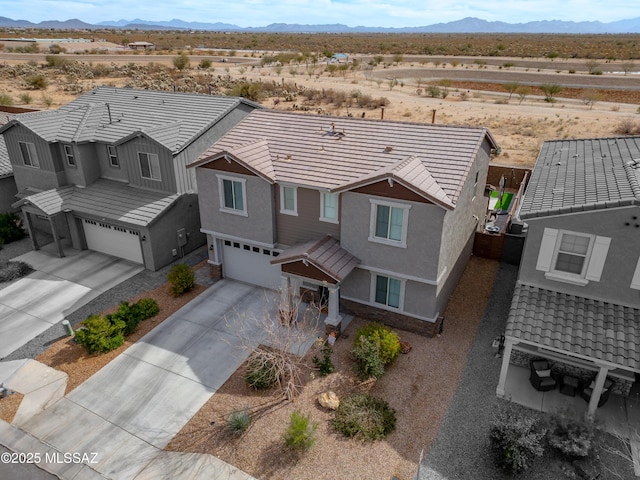 bird's eye view featuring view of desert and a mountain view