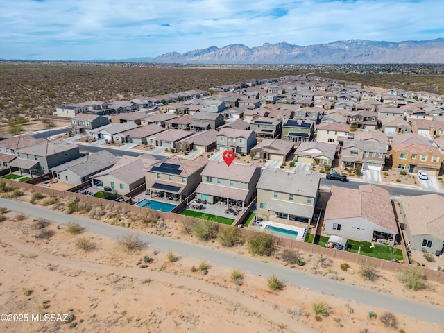 bird's eye view with a mountain view and a residential view