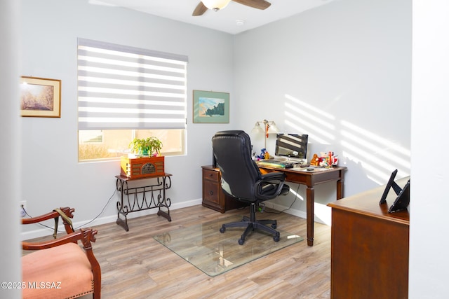 office area with ceiling fan, wood finished floors, and baseboards