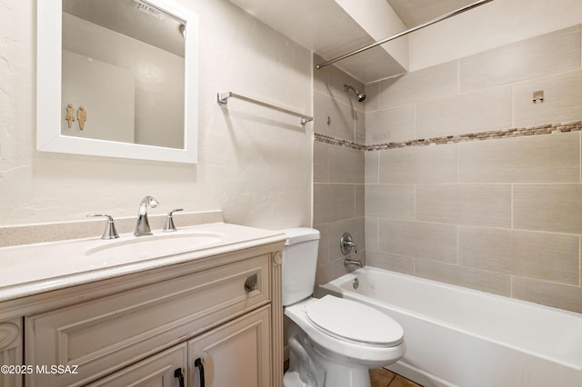 full bath featuring shower / tub combination, vanity, and toilet