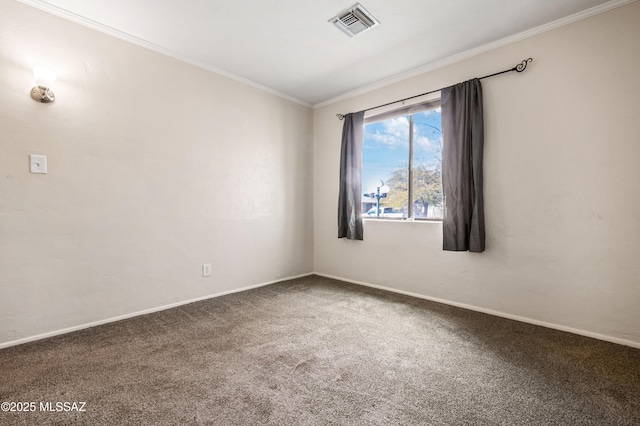 carpeted empty room featuring ornamental molding, visible vents, and baseboards