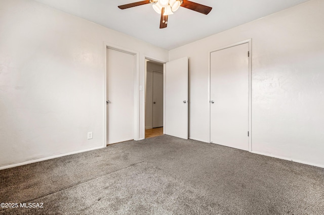 unfurnished bedroom featuring ceiling fan and carpet flooring