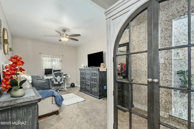 bedroom with carpet floors and baseboards