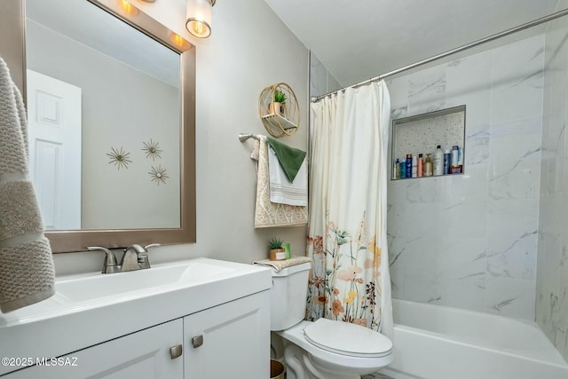 full bathroom featuring shower / bath combination with curtain, vanity, and toilet