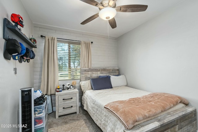 bedroom featuring carpet and a ceiling fan