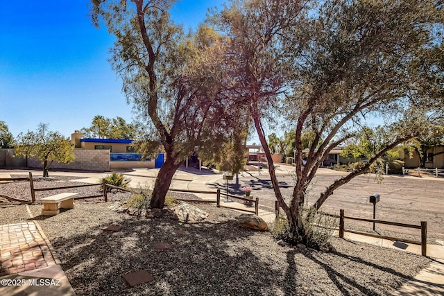 view of yard featuring fence