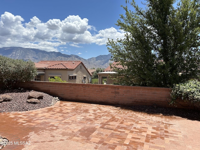 2090 E Buster Mountain Dr, Oro Valley, AZ 85755 - view of patio with a mountain view and fence