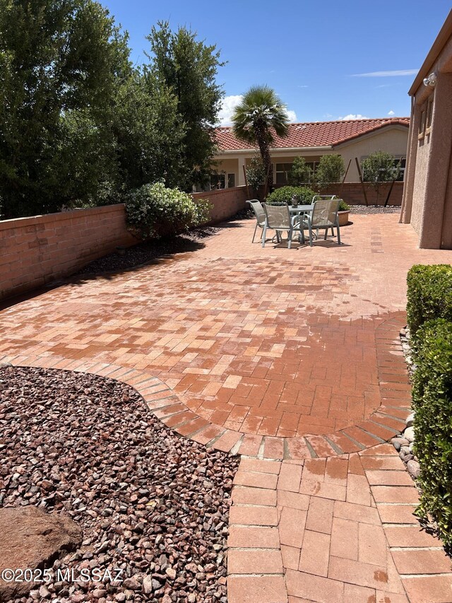 2090 E Buster Mountain Dr, Oro Valley, AZ 85755 - view of patio featuring outdoor dining area and fence