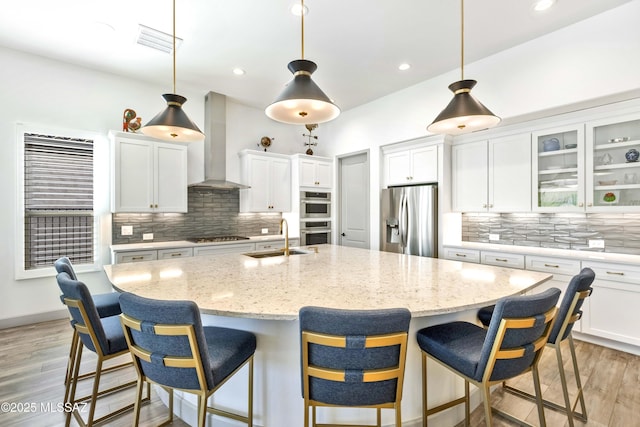 30755 S Chestnut Way, Oracle, AZ 85623 - kitchen featuring stainless steel appliances, wall chimney exhaust hood, a sink, tasteful backsplash, and recessed lighting