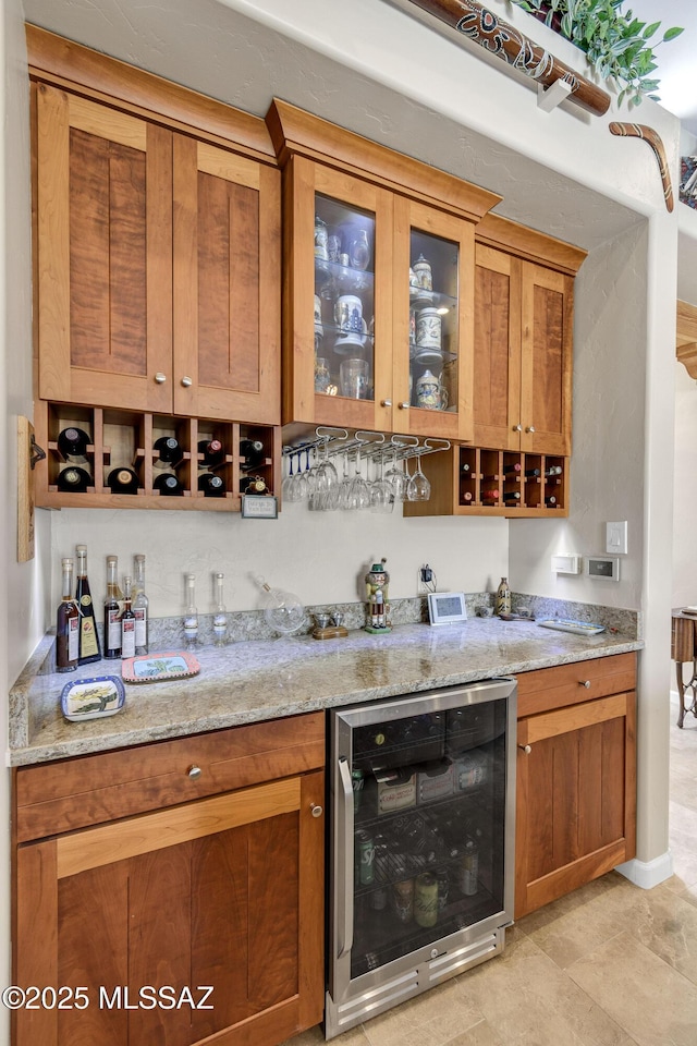 bar featuring wine cooler and bar