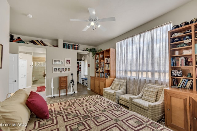 living area featuring ceiling fan