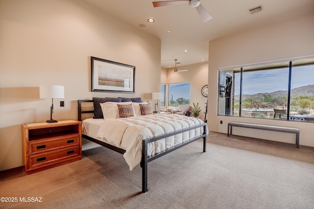 bedroom with light carpet, visible vents, recessed lighting, and ceiling fan