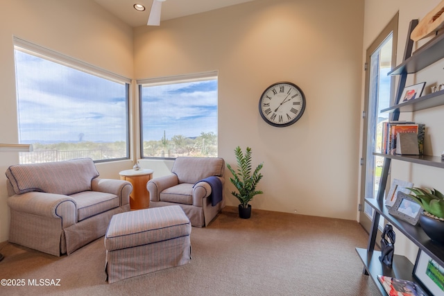 living area with recessed lighting and carpet floors