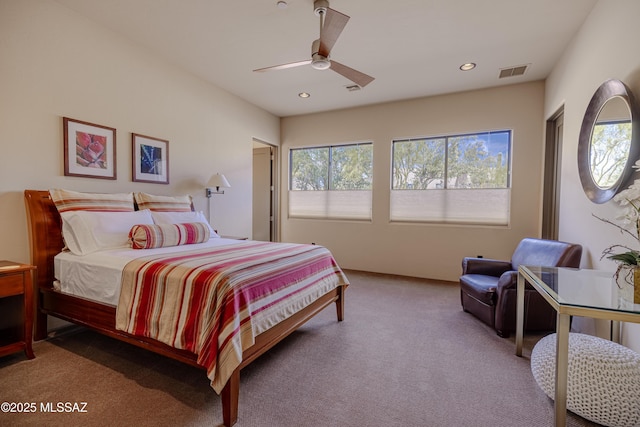 carpeted bedroom with recessed lighting, visible vents, and ceiling fan