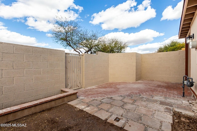 view of patio featuring a fenced backyard