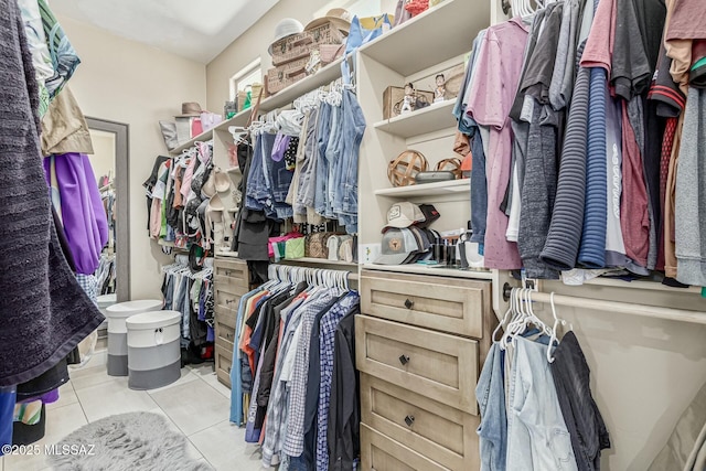 spacious closet with tile patterned flooring