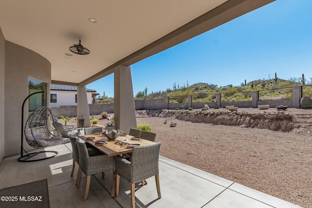 view of patio / terrace featuring outdoor dining area and a fenced backyard