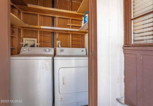 laundry area featuring laundry area and separate washer and dryer