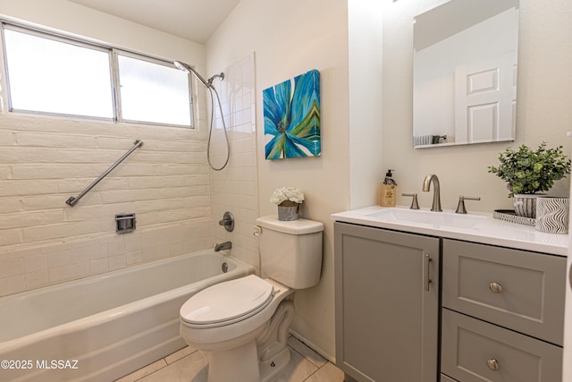 bathroom featuring tile patterned flooring, vanity, toilet, and washtub / shower combination