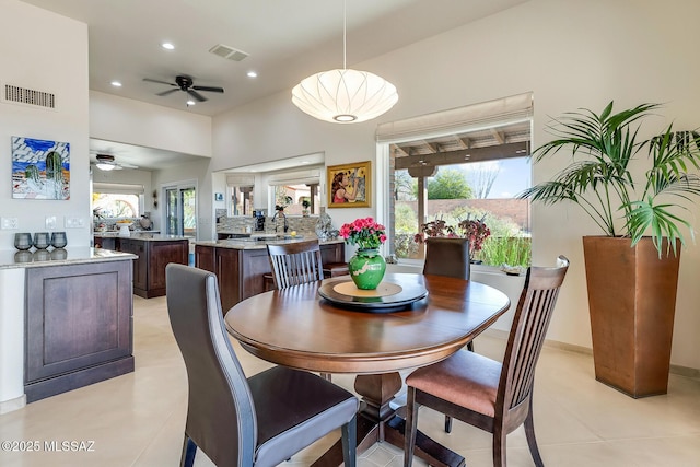 dining area featuring a ceiling fan, recessed lighting, visible vents, and baseboards