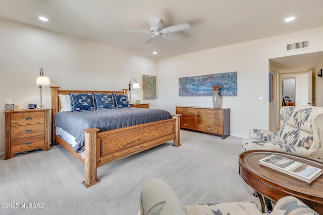 bedroom with recessed lighting, light colored carpet, visible vents, and ceiling fan