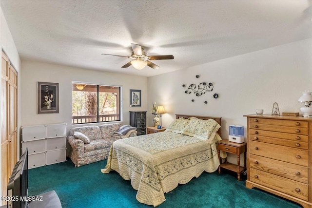 bedroom with carpet floors, a closet, ceiling fan, and a textured ceiling