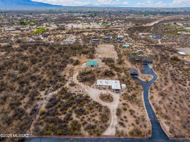 drone / aerial view featuring a mountain view