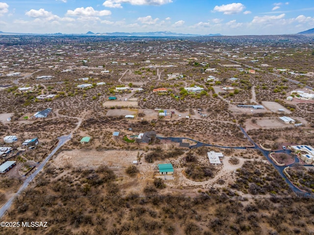 aerial view with view of desert and a mountain view