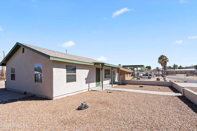 view of front facade featuring stucco siding