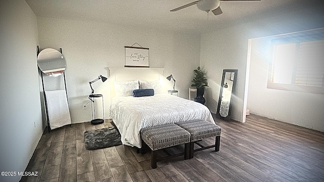 bedroom with a ceiling fan and wood finished floors