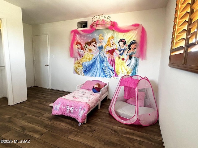 bedroom featuring wood-type flooring