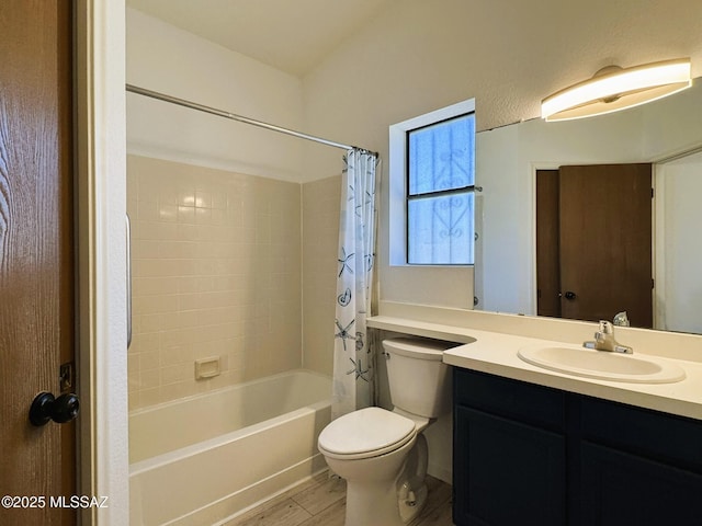 bathroom featuring shower / tub combo, toilet, wood finished floors, and vanity