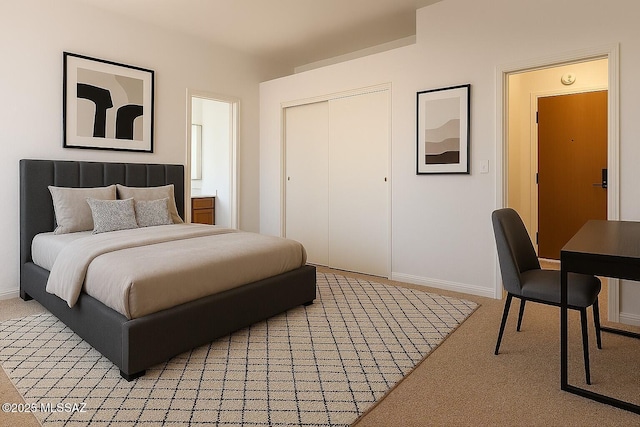 bedroom featuring light carpet, baseboards, and a closet