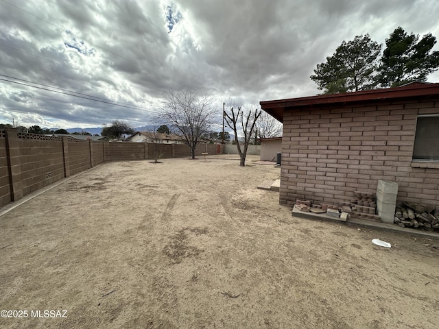 view of yard featuring a fenced backyard