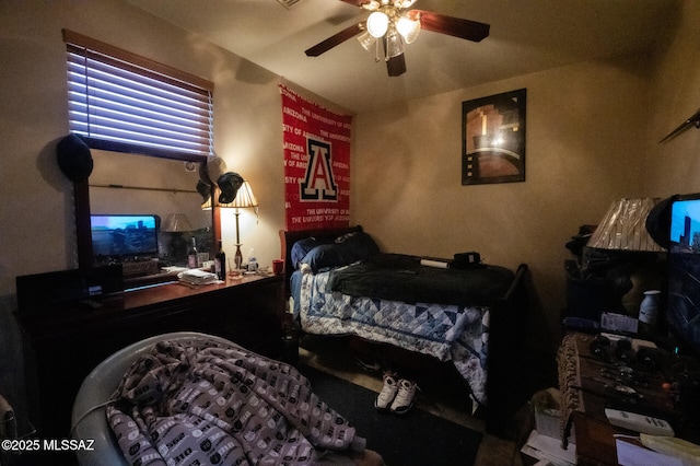 bedroom featuring ceiling fan