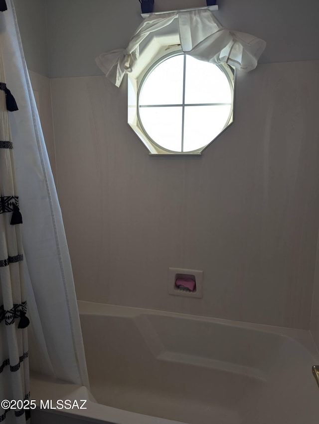 full bathroom with shower / bathtub combination with curtain