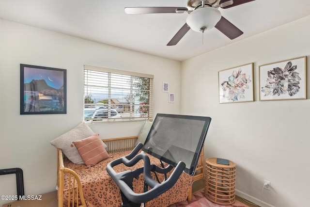 interior space featuring ceiling fan