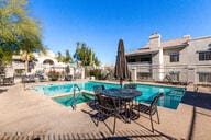 pool with a patio area