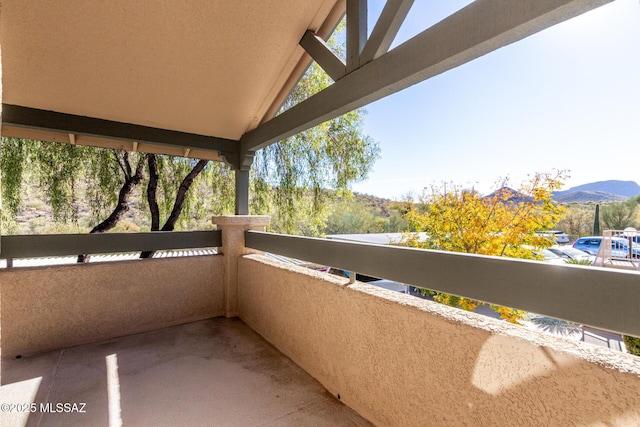 balcony featuring a mountain view