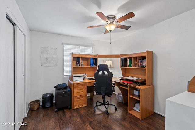 office with dark wood-type flooring and ceiling fan