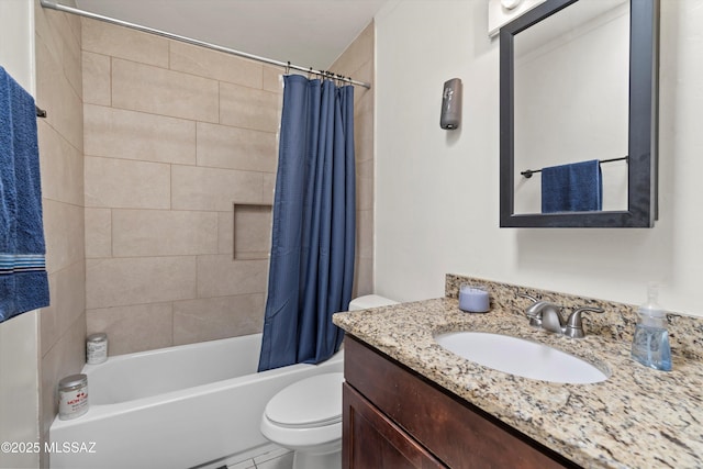 full bathroom featuring toilet, vanity, and shower / tub combo