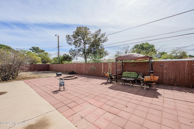 view of patio with a fenced backyard and an outdoor living space