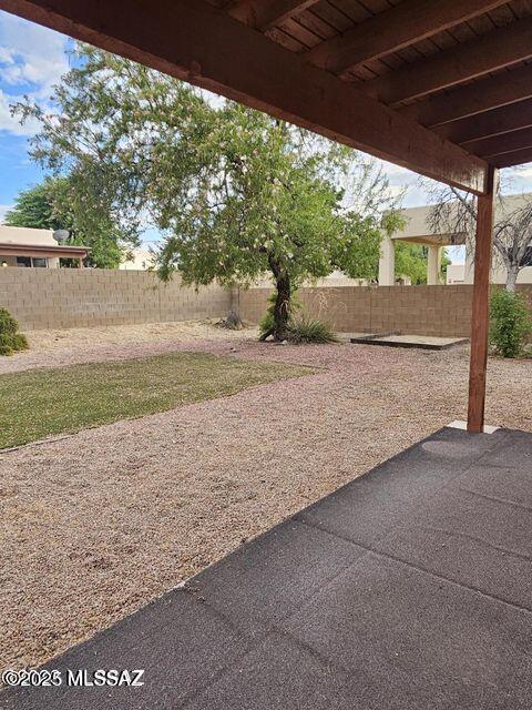 view of yard with a fenced backyard and a patio