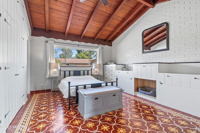 tiled bedroom featuring wood ceiling, brick wall, and vaulted ceiling with beams