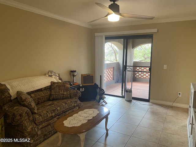 living area featuring baseboards, a ceiling fan, ornamental molding, and light tile patterned flooring