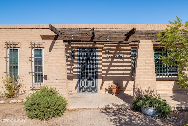 exterior space with a pergola