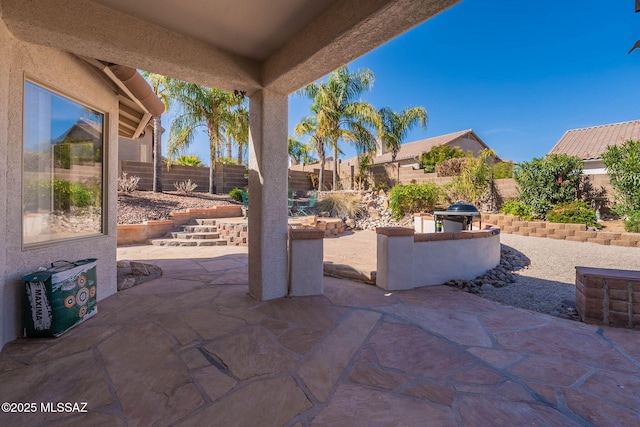 view of patio with a fenced backyard