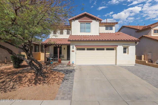mediterranean / spanish-style home featuring concrete driveway, a porch, stucco siding, and a tile roof