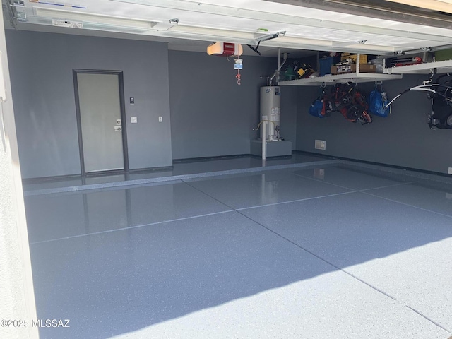 garage with a garage door opener and gas water heater