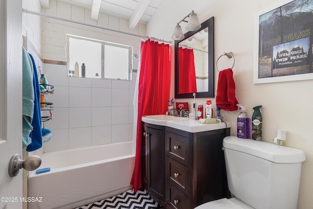 full bath with shower / tub combo, vanity, and toilet